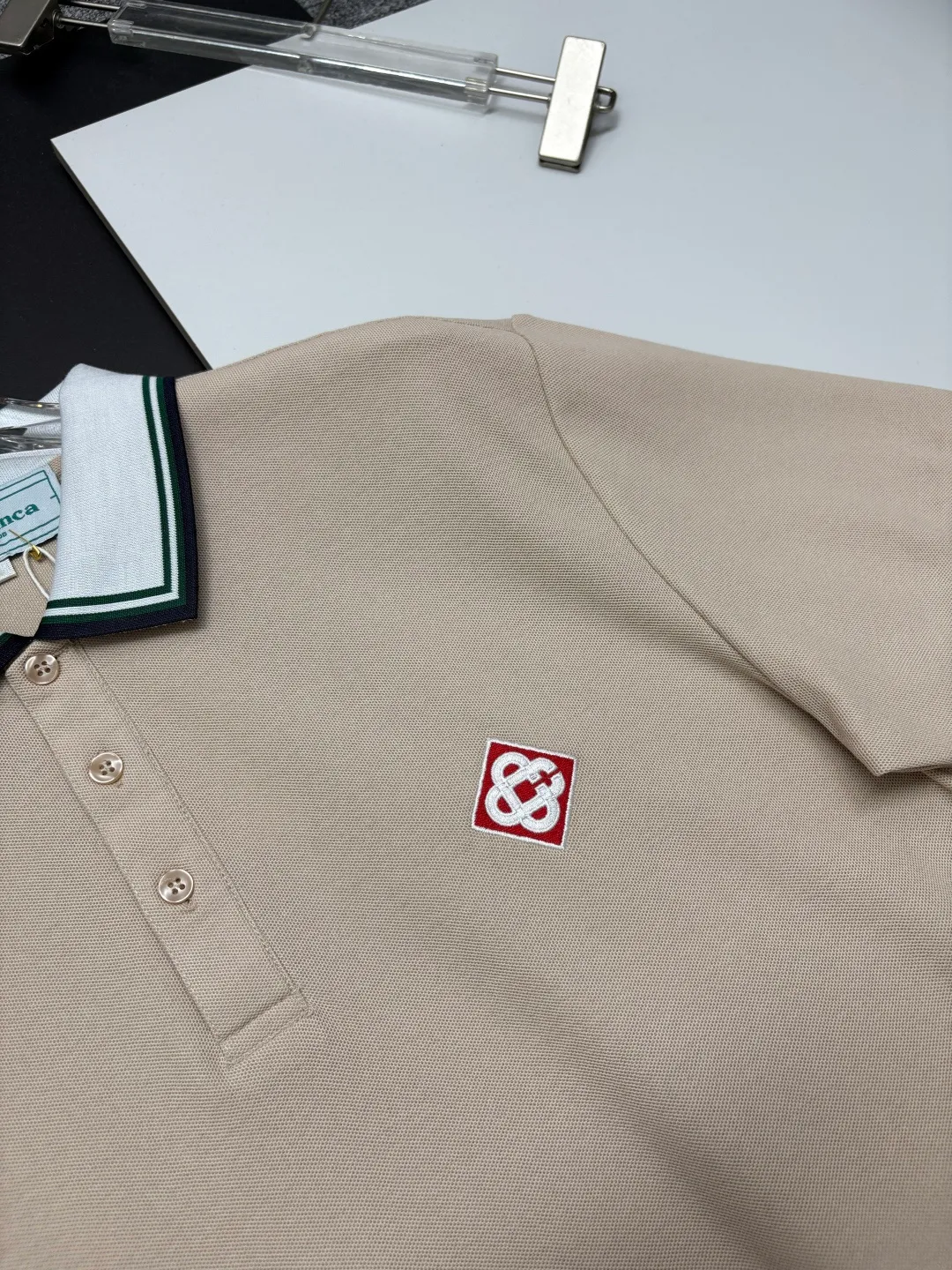 CASABLANCA New Arrival embroidered Polo shirt, original fabric, official Same Style, made of pure cotton pique fabric, customized vat-dyed fabric, feels very comfortable and smooth, very wide and stylish, produced by the first-line brand Factory, imported Behringer embroidery machine, embroidery is full and textured, collar and collar ribs are woven with imported yarn, does not deform after long-term wear, the latest New Arrival style in spring and summer, fashionable and individual Super Versatile, a good-looking one. It is very suitable for both men and women. It is a must-have for everyone. Color: Black White, Apricot, Blue Khaki Size: M-3XL